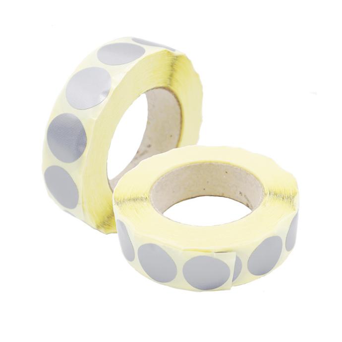 Die-cut adhesive circles made from adhesive tape